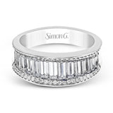 Vertical baguette diamonds are complemented by lines of round diamonds in this stunning band, sure to make a statement.