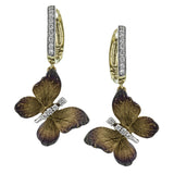Two lovely golden butterflies are suspended beneath .19 ctw of diamonds, making these remarkable earrings truly memorable.