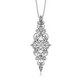 The lacy filigree design of this vintage style white gold pendant is highlighted by .69 ctw of shimmering round cut white diamonds.