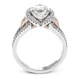 Featuring a lovely pear-shaped halo, this contemporary white and rose gold engagement setting is complemented by a split shank design containing .45 ctw round cut white diamonds and .08 ctw pink diamonds.
