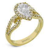 Featuring a lovely pear-shaped halo, this contemporary white and rose gold engagement setting is complemented by a split shank design containing .45 ctw round cut white diamonds and .08 ctw pink diamonds.