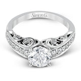 Presenting a purely romantic setting, this remarkable white gold engagement ring is set with .41 ctw of glimmering round cut white diamonds.