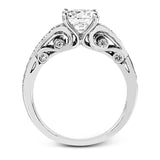 Presenting a purely romantic setting, this remarkable white gold engagement ring is set with .41 ctw of glimmering round cut white diamonds.