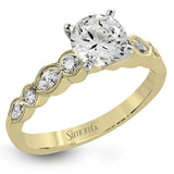 Classically designed, yet featuring a modern flair, this delicate white gold engagement ring and wedding band set are accentuated with .28 ctw round cut white diamonds and .46 ctw marquise cut diamonds.