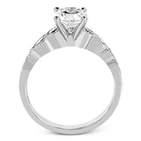 Classically designed, yet featuring a modern flair, this delicate white gold engagement ring and wedding band set are accentuated with .28 ctw round cut white diamonds and .46 ctw marquise cut diamonds.