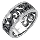 Black and white 14k gold combine to create a statement piece in this band featuring a scrolling pattern and .41cttw diamonds.