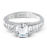 Reflecting a dazzling contemporary design, this incredible white gold ring is set with 1.11 ctw of shimmering baguette cut diamonds.