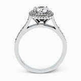 Showcasing a dazzling halo, this contemporary white gold wedding set is highlighted by .45 ctw of arresting round cut white diamonds.