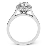 Showcasing a dazzling halo, this contemporary white gold wedding set is highlighted by .45 ctw of arresting round cut white diamonds.