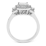 Featuring a lovely romantic setting, this white gold contemporary ring features an exquisite halo and .33 ctw of shimmering round cut white diamonds complemented by .34 ctw of trapezoid side diamonds.