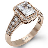 This romantic white gold engagement ring is complemented by .57 ctw of sparkling round cut white diamonds in a vintage-inspired setting.