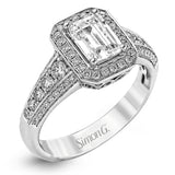 This romantic white gold engagement ring is complemented by .57 ctw of sparkling round cut white diamonds in a vintage-inspired setting.