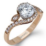 The charming floral design of this contemporary white gold ring is enhanced by .28 ctw of round cut white diamonds and .07 ctw of marquise cut white diamonds.