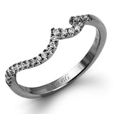 The charming floral design of this contemporary white gold ring is enhanced by .28 ctw of round cut white diamonds and .07 ctw of marquise cut white diamonds.