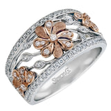 Showcasing a vintage garden floral design with a contemporary flair, this band-style ring is set with .53 ctw of sparkling round-cut white diamonds. Two rows of shimmering diamonds finish this ring.