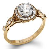 This sparkling white gold vintage inspired engagement ring features an exquisite halo and is set with .25 ctw round cut white diamonds.