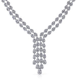 This show-stopping necklace evokes red carpet glamour with a remarkable 10.90 ctw of marquise shaped diamonds, 7.63 ctw of pear shaped diamonds, and 2.87 ctw round diamonds.