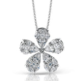 The elegant floral design of this white gold pendant is accentuated by a five petal design with .15 ctw of princess cut diamonds, .48 ctw pear shaped diamonds and .42 ctw marquise cut diamonds.