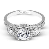 This dramatic contemporary white gold ring is accentuated by .37 ctw round cut white diamonds and features .30 ctw glimmering side stones.