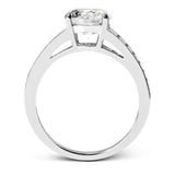 Baguette diamonds increasing in size lead the way to the center of this gorgeous engagement ring design. The outside edge is decorated with delicate milgrain, and this ring contains .98 ctw of side diamonds.