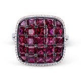A contemporary WG domed ring with PC rubies 4.70 ctw set in black rhodium, accented by white diamonds .45 ctw in rose gold