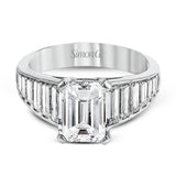 Presenting a thoroughly modern design, this impressive white gold engagement ring features 1.64 ctw of sparkling white baguette cut diamonds.