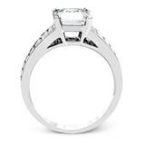 Presenting a thoroughly modern design, this impressive white gold engagement ring features 1.64 ctw of sparkling white baguette cut diamonds.