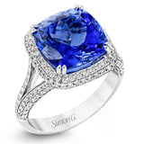 This eye-catching white gold ring is set with a remarkable 5.34 ctw sapphire accentuated by .68 ctw glistening round cut white diamonds.