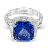 This eye-catching white gold ring is set with a remarkable 5.34 ctw sapphire accentuated by .68 ctw glistening round cut white diamonds.