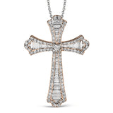 This striking white gold cross pendant is accented by the presence of .40 ctw round white diamonds and .56 ctw baguette cut diamonds.