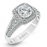 The classic design of this white gold engagement ring is emphasized by .44 ctw of dazzling round cut white diamonds.