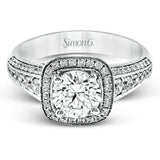 The classic design of this white gold engagement ring is emphasized by .44 ctw of dazzling round cut white diamonds.