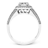 The classic design of this white gold engagement ring is emphasized by .44 ctw of dazzling round cut white diamonds.