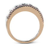 This gorgeous white and rose gold band is accentuated by .24 ctw of round cut white diamonds and 1.70 ctw of Asscher cut diamonds.