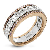 This gorgeous white and rose gold band is accentuated by .24 ctw of round cut white diamonds and 1.70 ctw of Asscher cut diamonds.