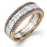 The classic design of this white and rose gold band is highlighted by .28 ctw round cut pink diamonds with 1.67 ctw of Asscher cut diamonds accents.