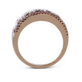 The classic design of this white and rose gold band is highlighted by .28 ctw round cut pink diamonds with 1.67 ctw of Asscher cut diamonds accents.