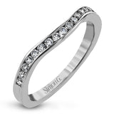 This classically designed white gold ring is emphasized by .18 ctw of white diamonds and .51 half moon shaped diamonds to create a memorable setting.