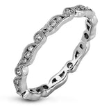 Featuring a contemporary stackable design, this white gold band is accented by a collection of .28 ctw of white diamonds.