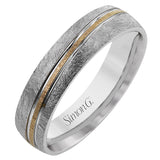This men's band has a contemporary feel and a lived-in texture with one line of rose gold in the middle surrounded by white gold.