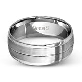 This memorable two-tone men's wedding band features double columns of matte white gold outlined with a sleek outline of yellow gold.