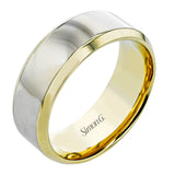A distinctive combination of white gold combined with a rose gold silhouette creates an impressive design for this men's wedding band.