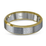 A distinctive combination of white gold combined with a rose gold silhouette creates an impressive design for this men's wedding band.