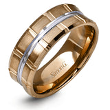 Two wide rows of sleek yellow gold are married with an elegant center cable of striking white gold in this arresting men's wedding band.