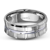 Two wide rows of sleek yellow gold are married with an elegant center cable of striking white gold in this arresting men's wedding band.