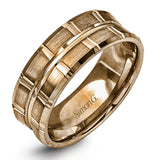 Two wide rows of sleek yellow gold are married with an elegant center cable of striking white gold in this arresting men's wedding band.