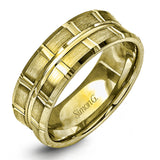Two wide rows of sleek yellow gold are married with an elegant center cable of striking white gold in this arresting men's wedding band.