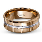 Two wide rows of sleek yellow gold are married with an elegant center cable of striking white gold in this arresting men's wedding band.