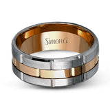 This brilliant two-tone men's wedding band features a center column of sleek yellow gold surrounded by two white gold silhouettes.