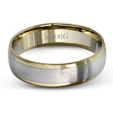 Featuring a modern twist on the classic wedding band design, this contemporary white gold men's wedding band has an eye-catching rose gold outline.